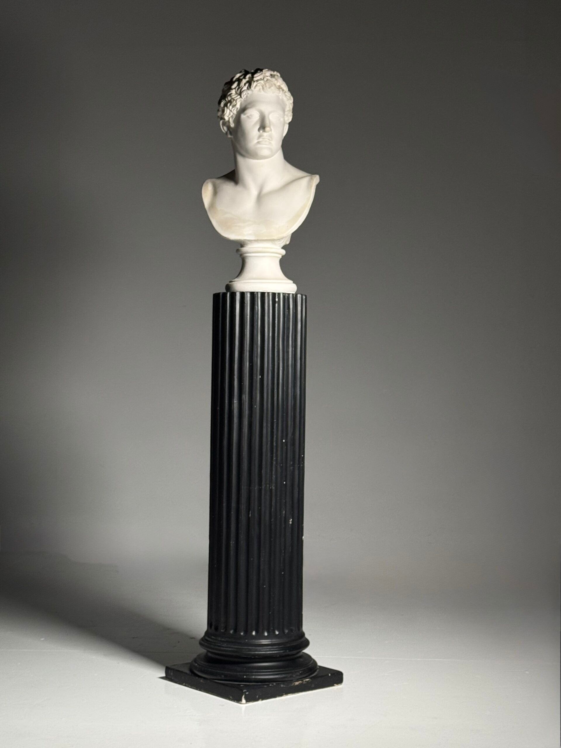 Neoclassical black plaster column