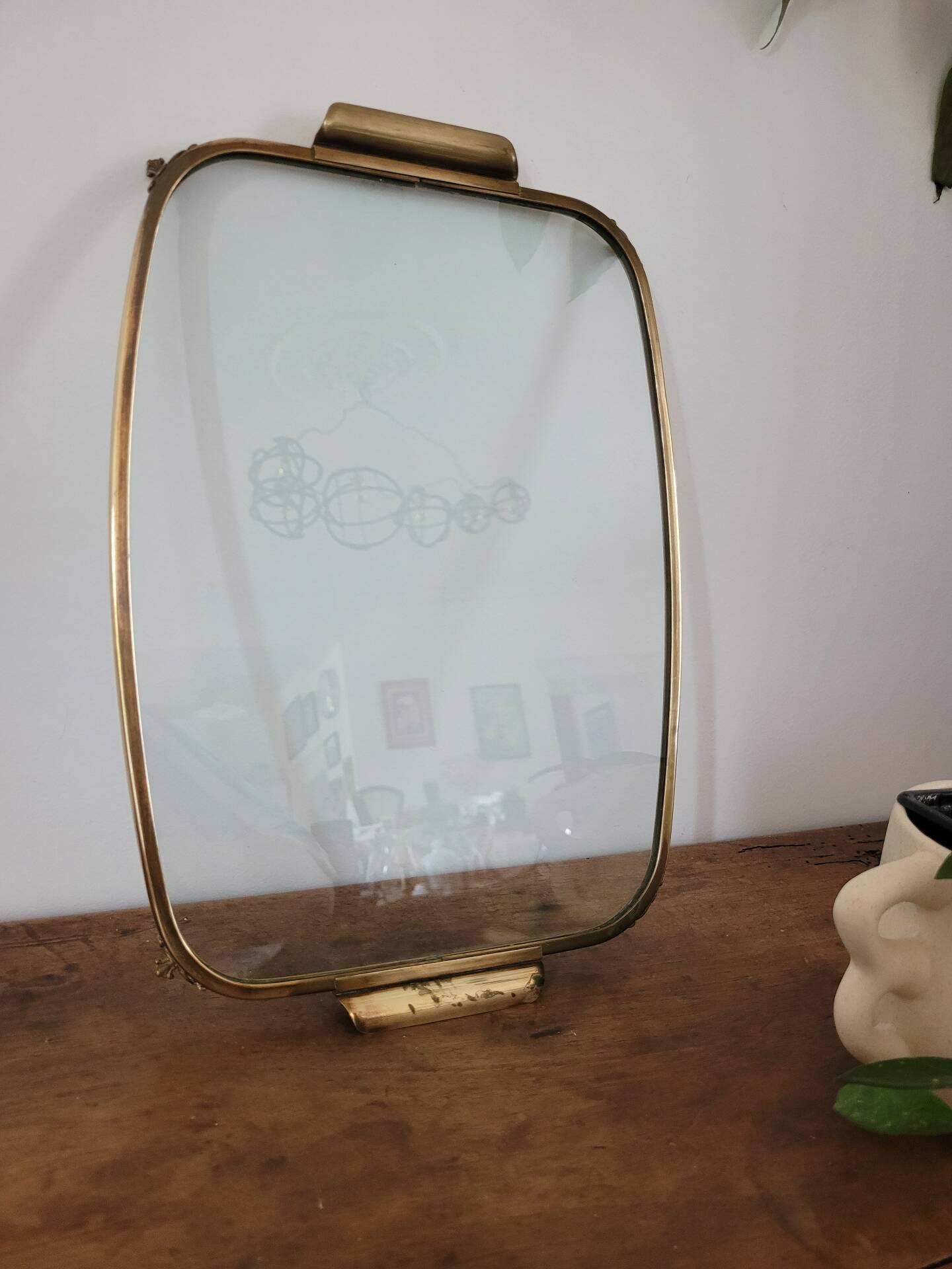Brass glass plateau from the early 20th century.