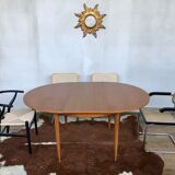 Large Scandinavian round table with 2 extensions, entirely made of teak