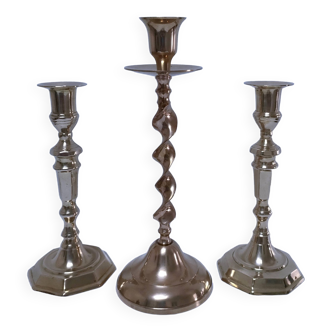 Three vintage solid brass candle holders