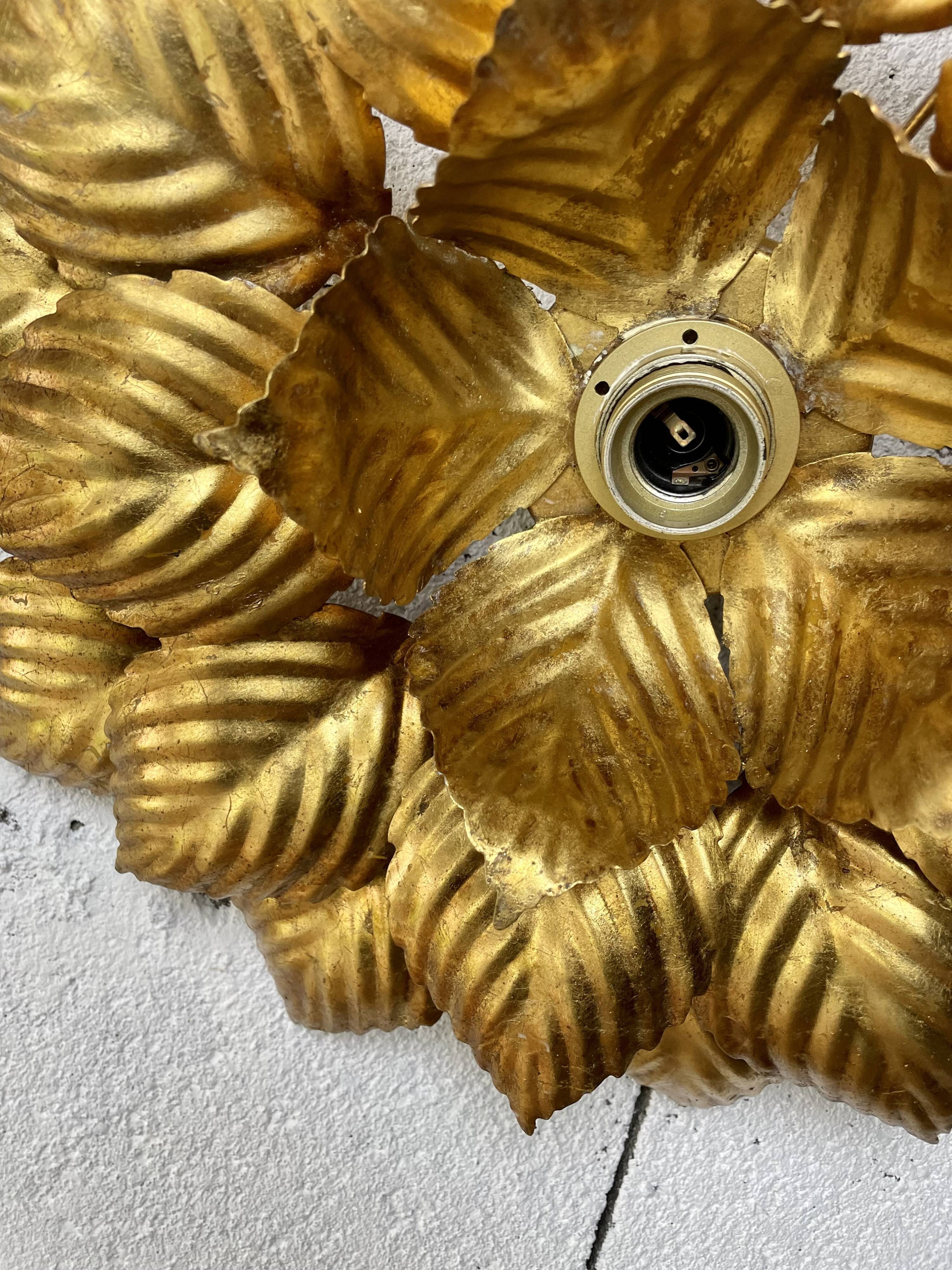 Vintage flower wall lamp in gilded metal