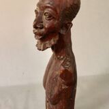 Bust Man in carved wood.