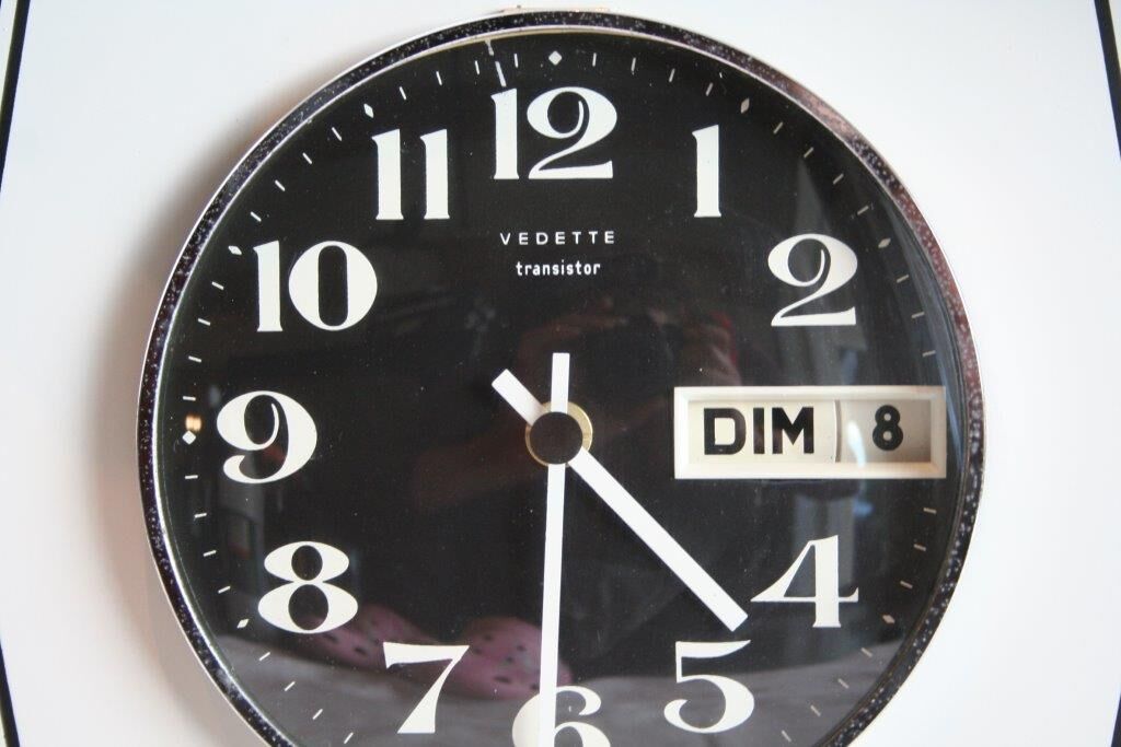 Vintage wall clock clock in formica featured transistor