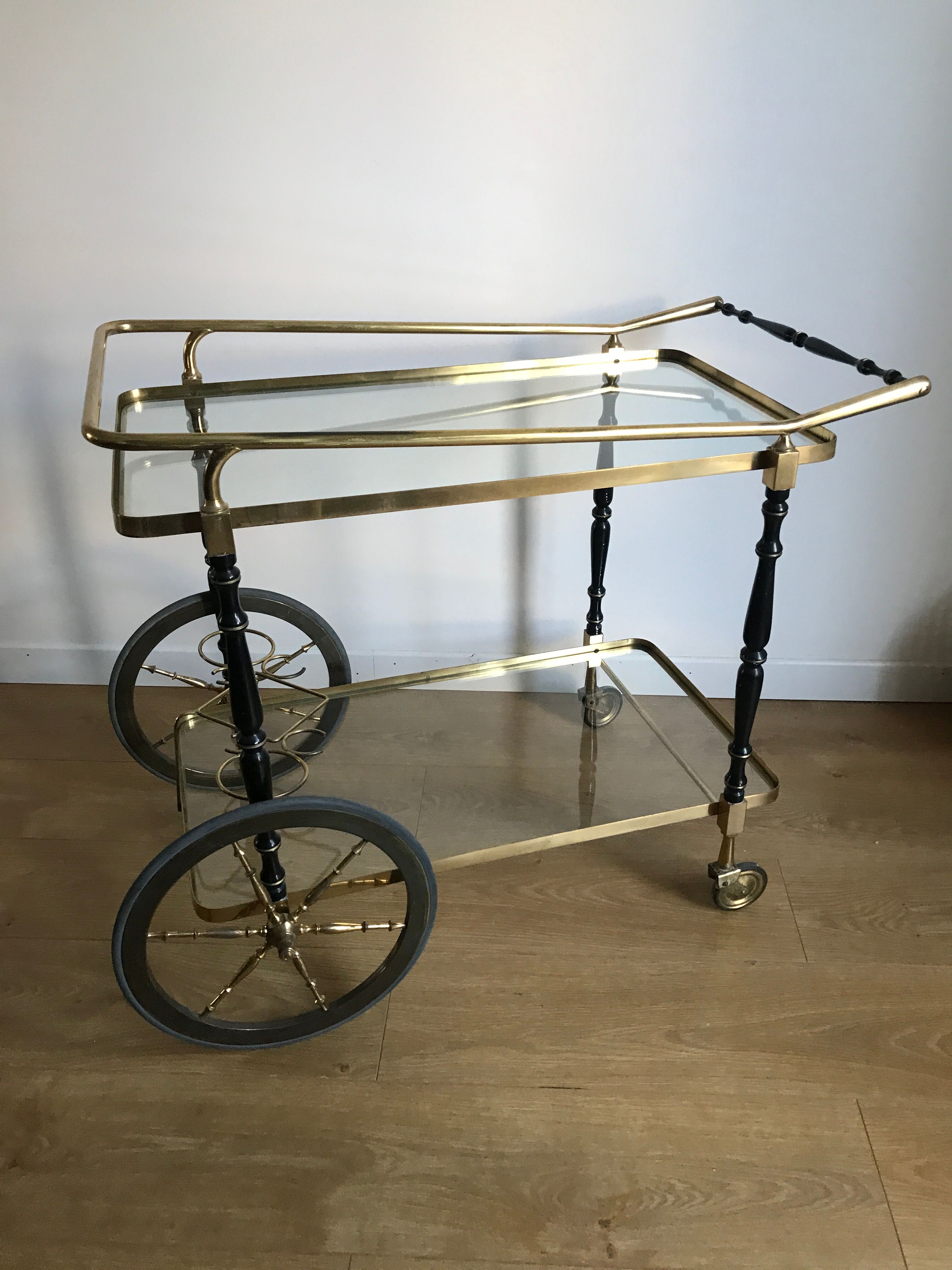 Vintage rolling golden and black dessert in brass and glass