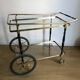 Vintage rolling golden and black dessert in brass and glass