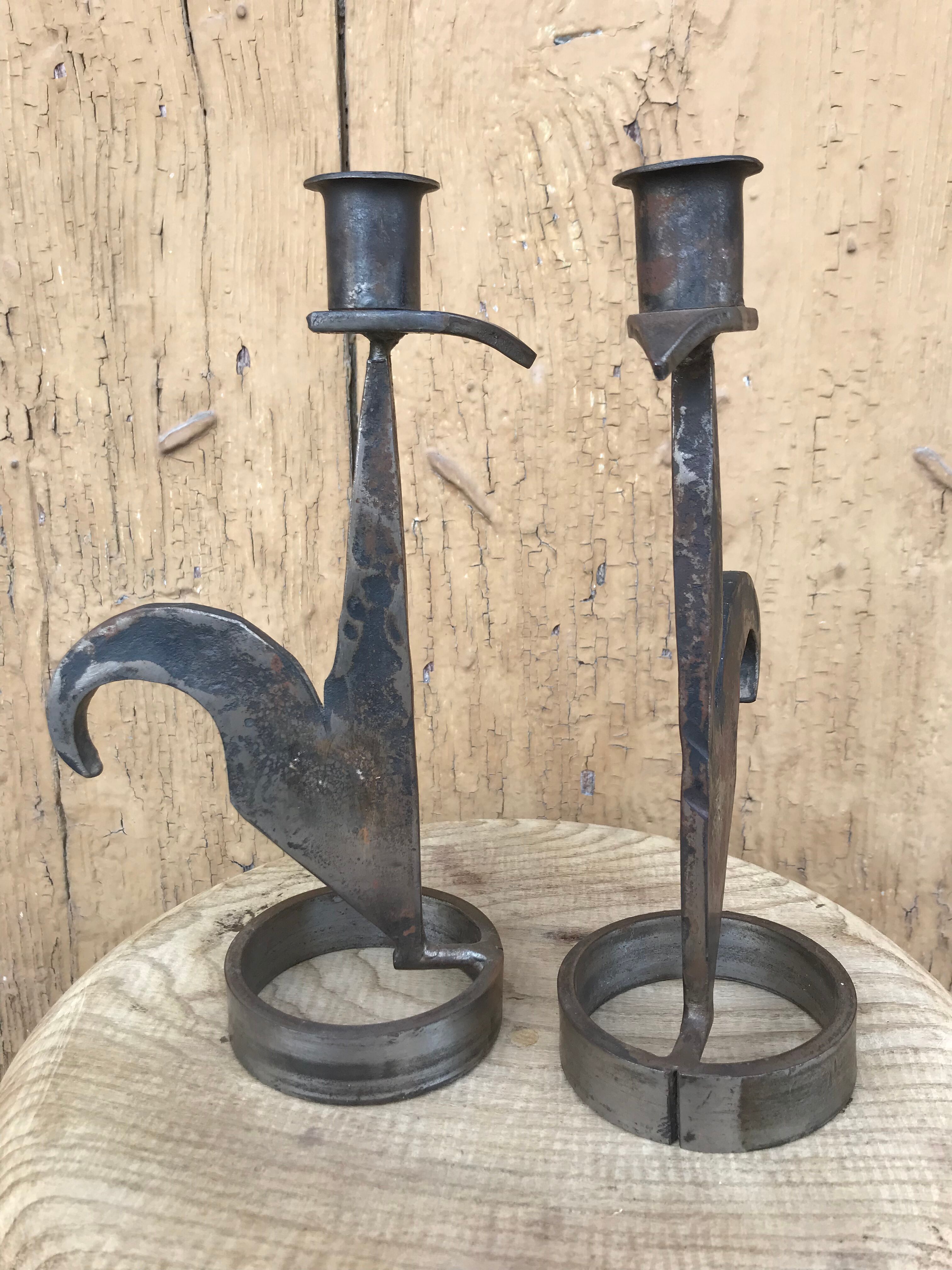 Signed zoomorphic iron candle holders