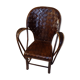 Old chair in chestnut tree