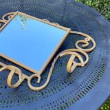 Wall-mounted gilded wrought iron coat rack with mirror