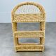 Rounded rattan shelf 60s