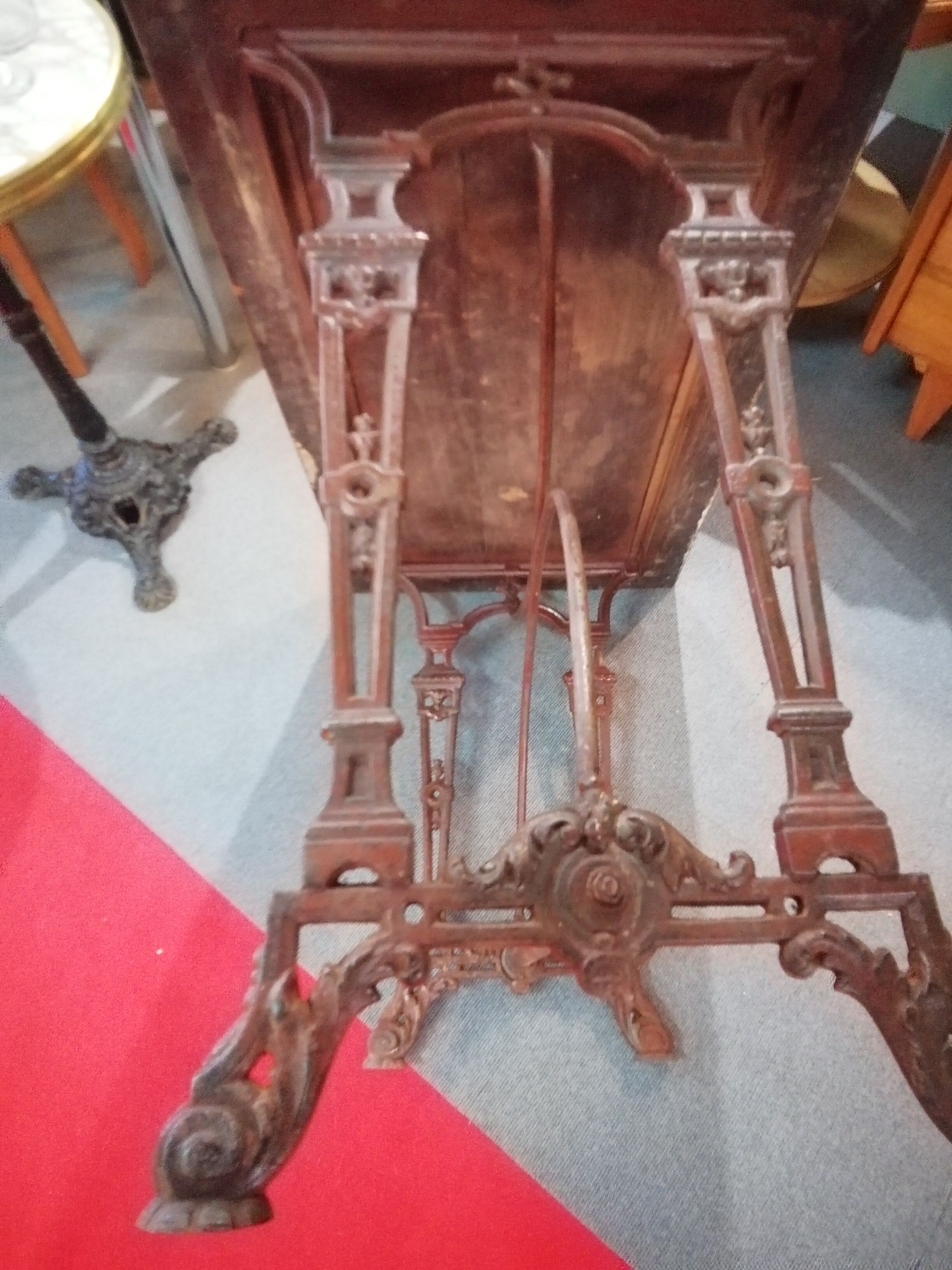 Bistro table over wood cast iron legs