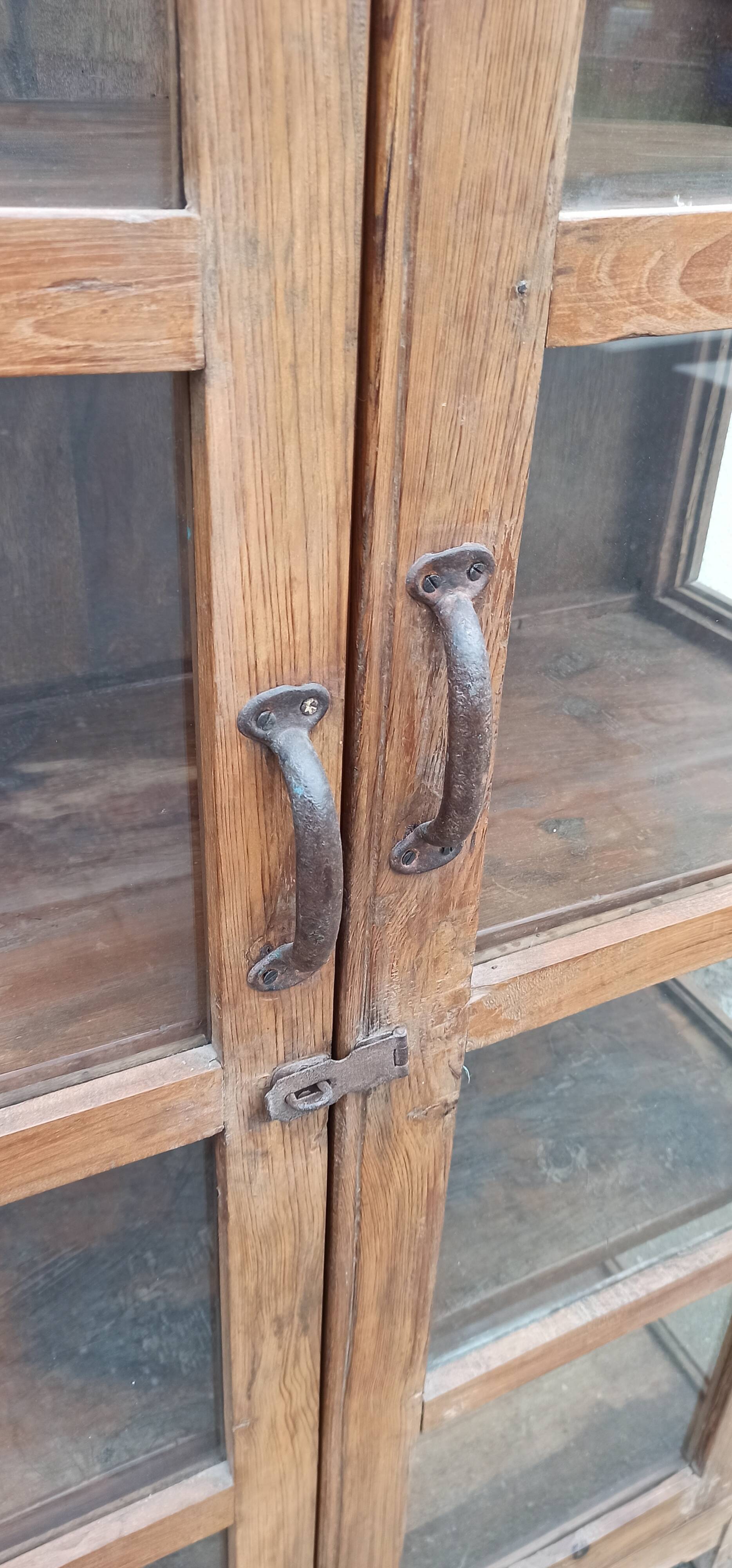 Old wooden cabinet display case with two doors