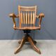 Antique American oak office chair with armrests 1920s