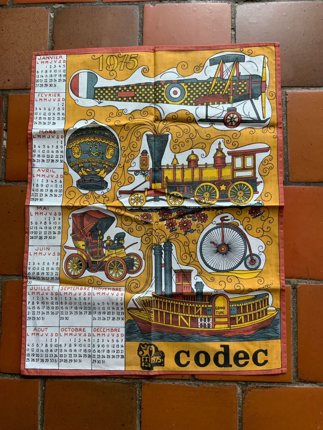 Torchon calendar 1975 grocery store Codec