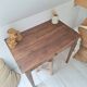 Old farmhouse side table in country style