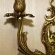 Pair of antique French wall sconces, gilded and bronzed, from the 1920s.
