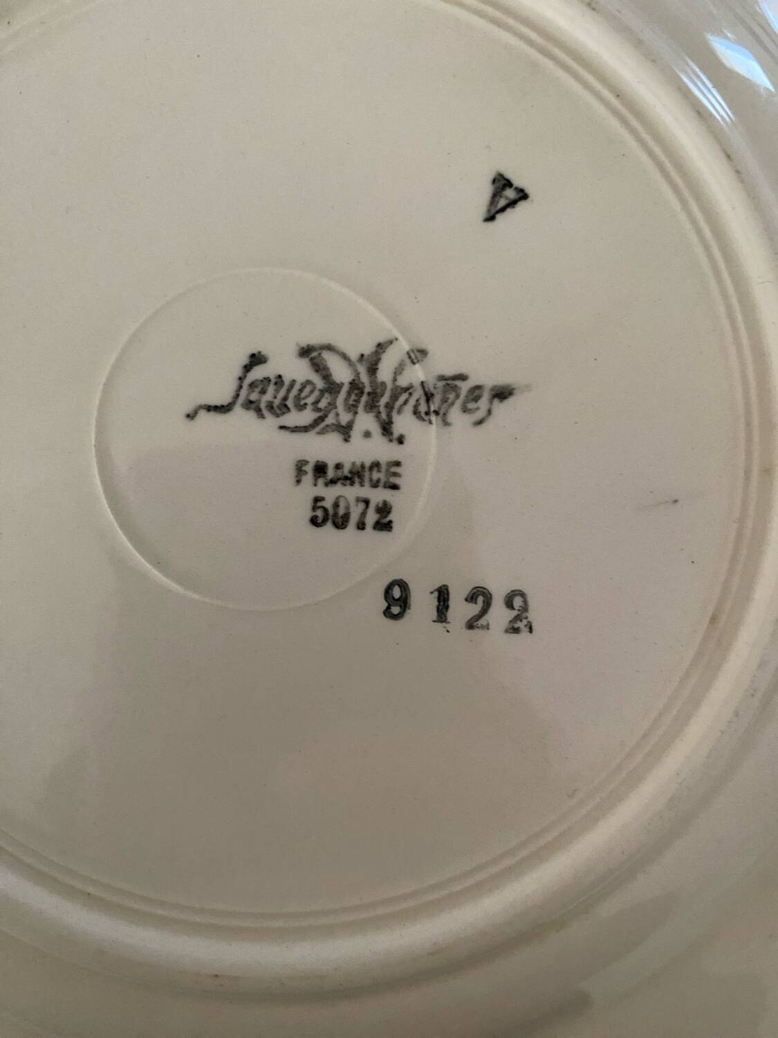 Flowered stamped dessert plates and matching ones.