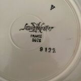 Flowered stamped dessert plates and matching ones.