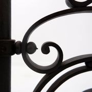 Art Nouveau Wrought iron tripod floor candlestick