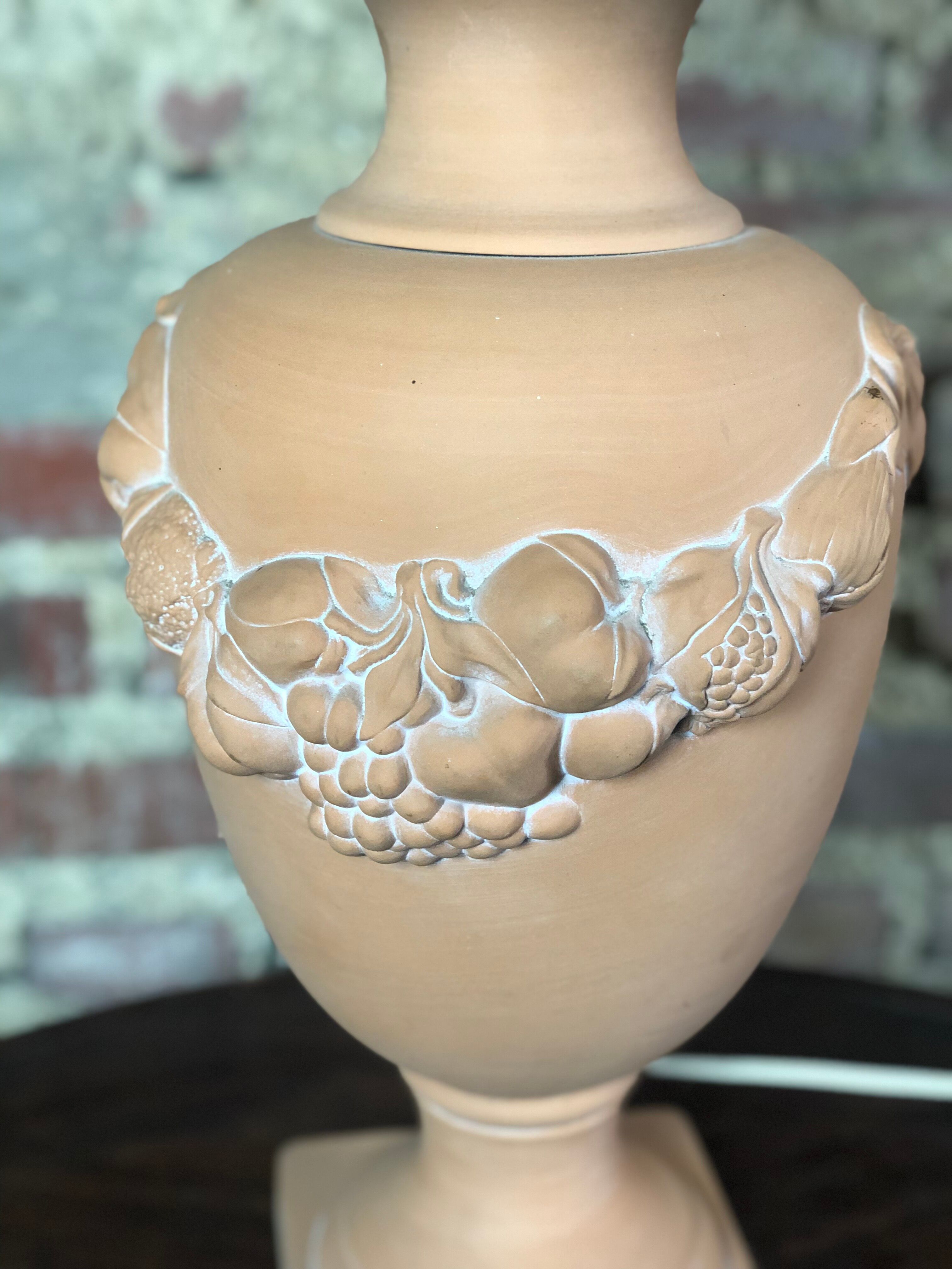 Terracotta lamp decorated with fruit crown