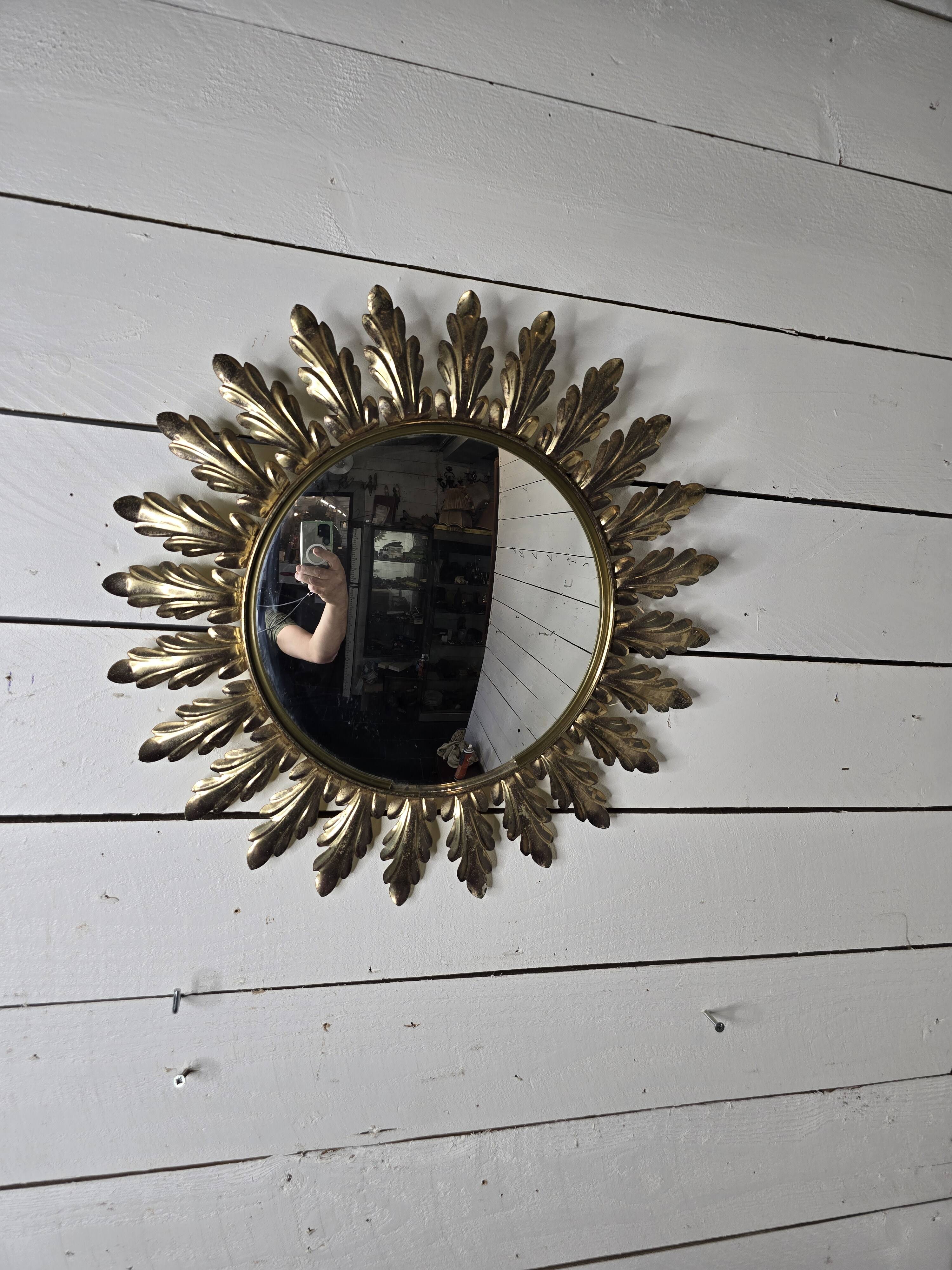 Witch's eye sun mirror in gold metal from the 60s