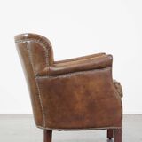 Fauteuil en cuir subtil avec coussin d'assise réversible en kilim