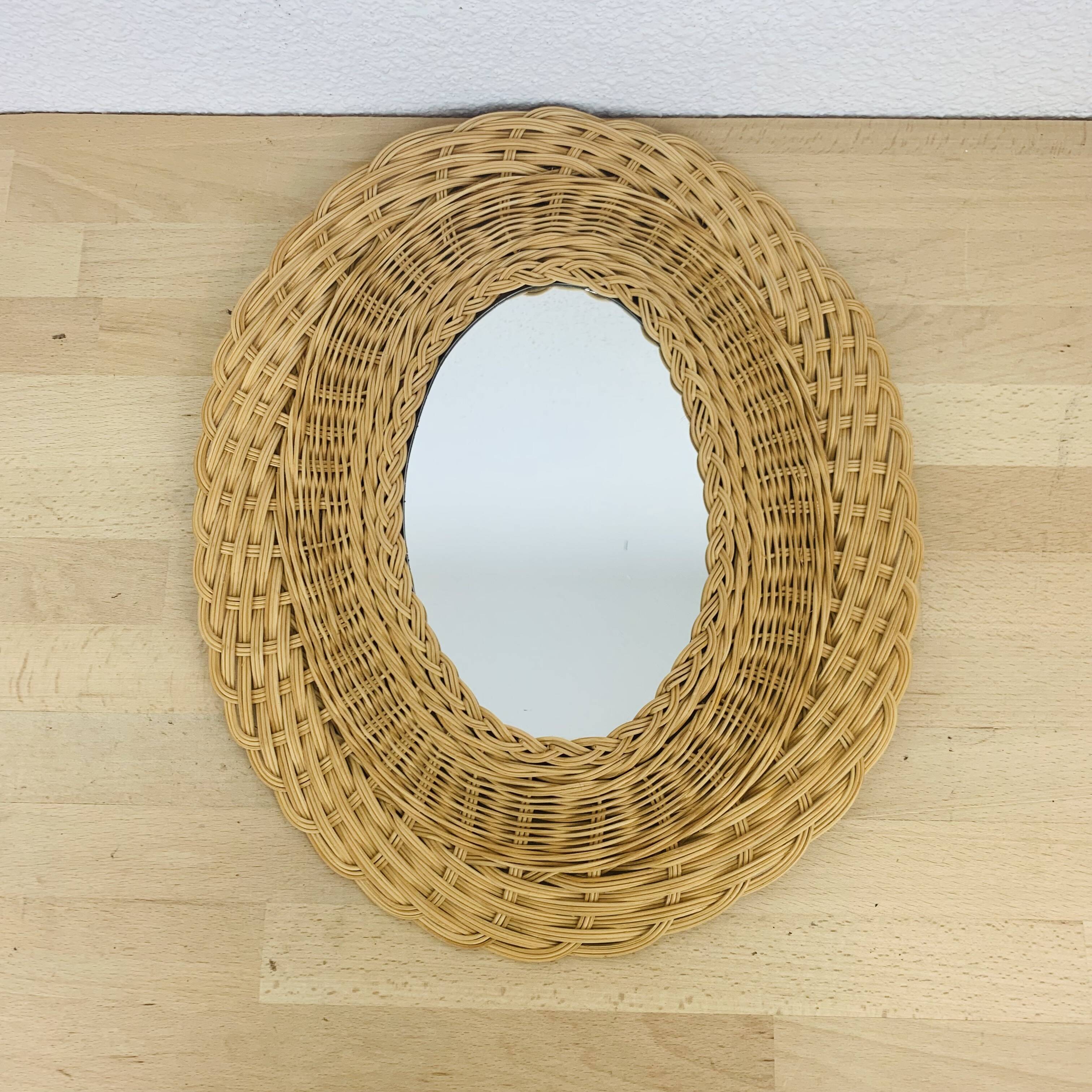 Vintage oval rattan mirror