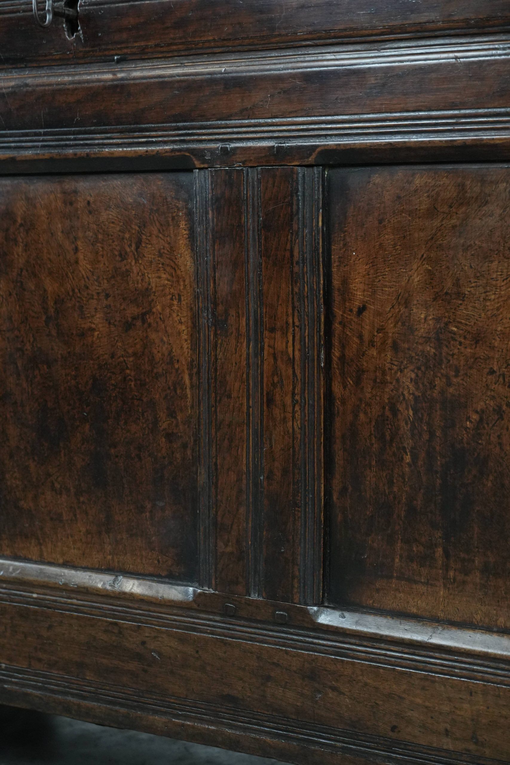 Large antique panelled English oak chest from the 18th century