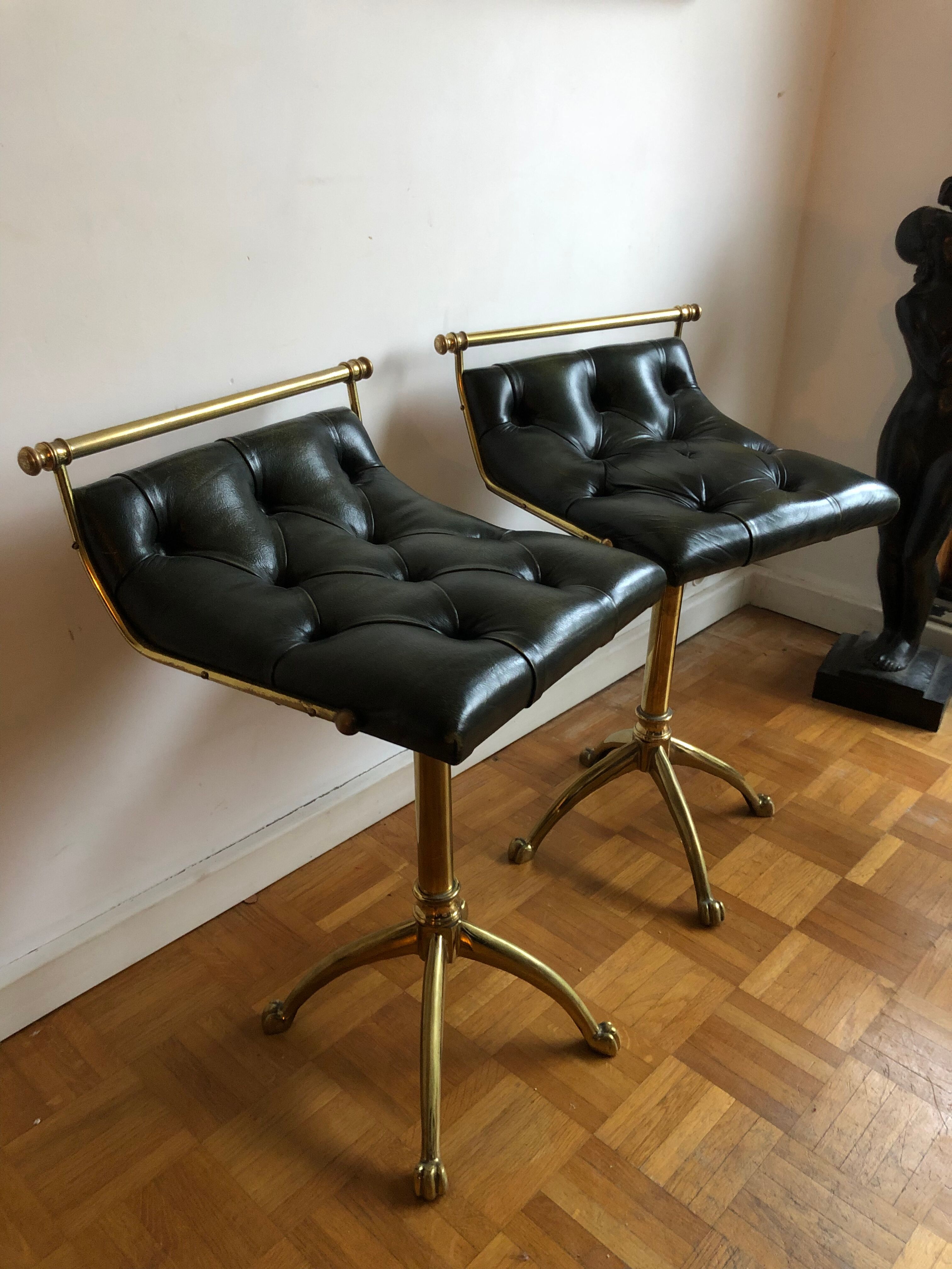 Pair of Chesterfield style brass and leather stools