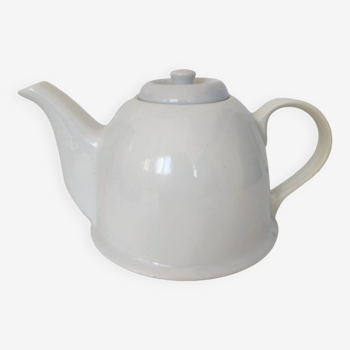 Small white porcelain teapot