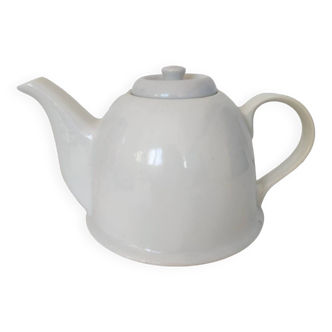 Small white porcelain teapot