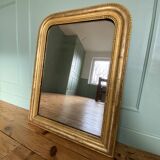 Louis-Philippe mirror gilded with gold leaf