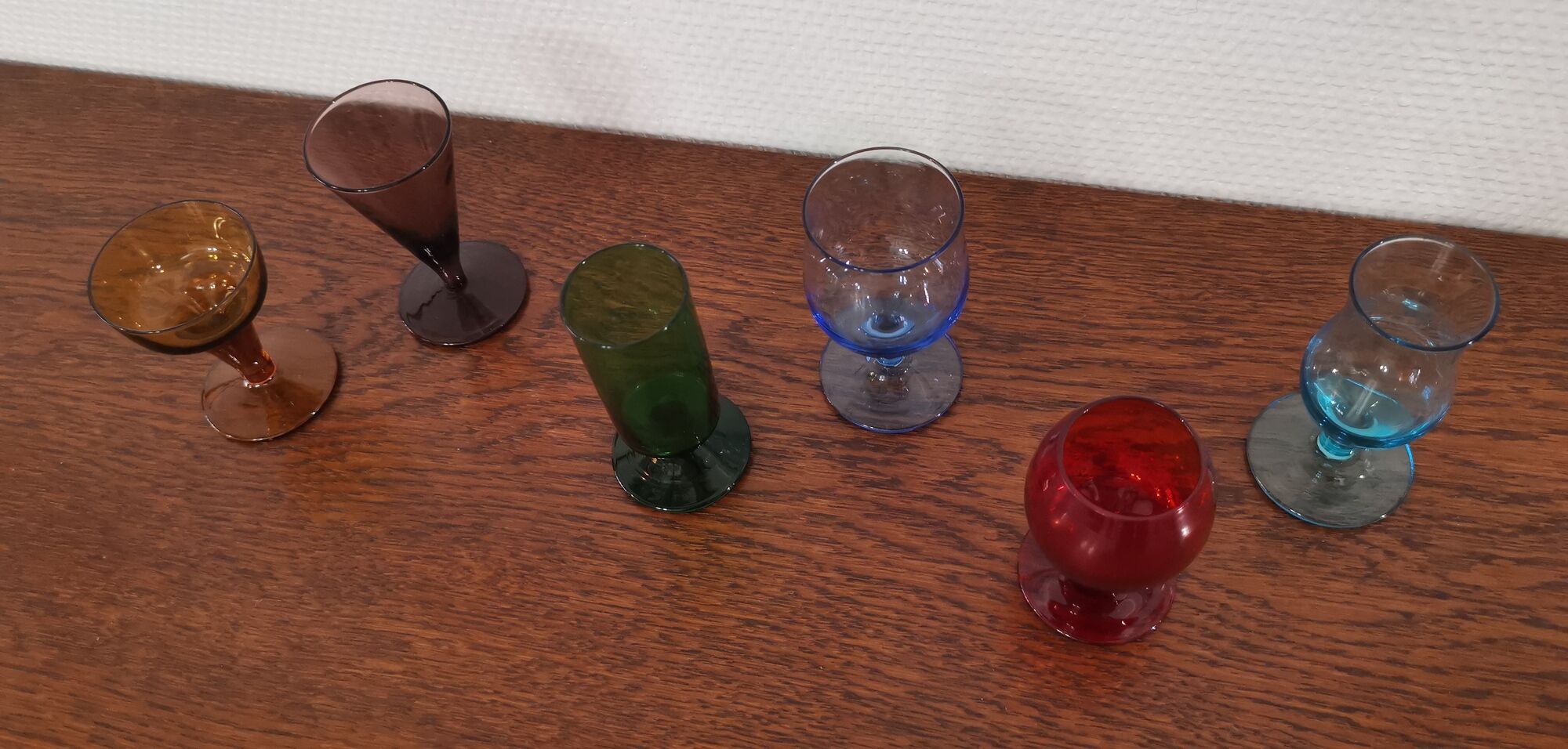 Set of 6 old liquor glasses on mismatched feet