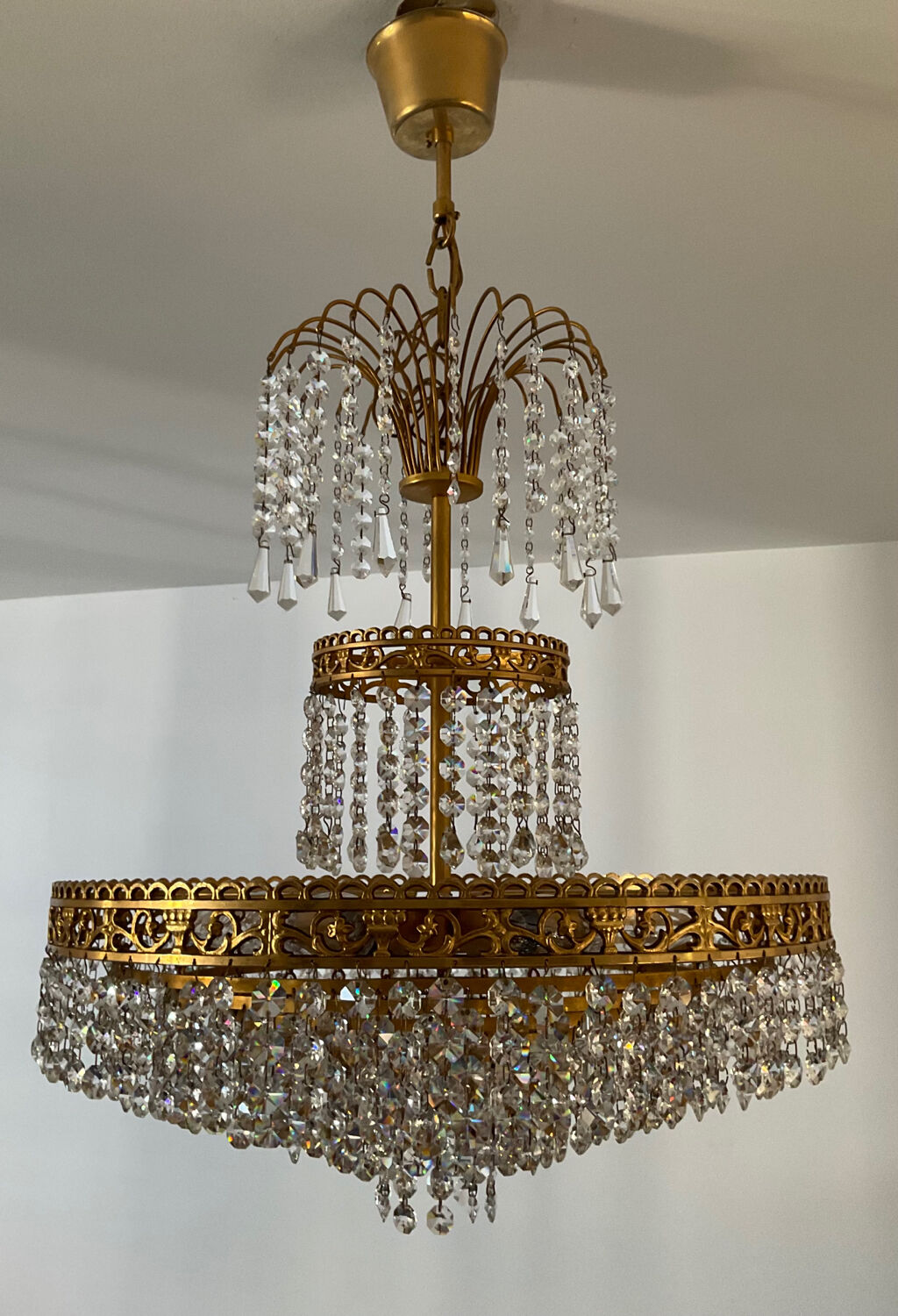 Cascade chandelier with crystal and bronze tassels