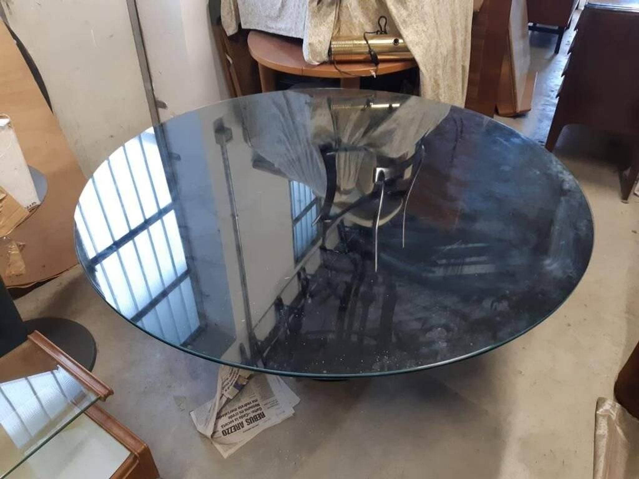 Black lacquered glass table and glass in the hoof style, Italy.