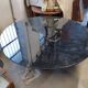 Black lacquered glass table and glass in the hoof style, Italy.