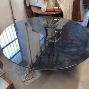 Black lacquered glass table and glass in the hoof style, Italy.
