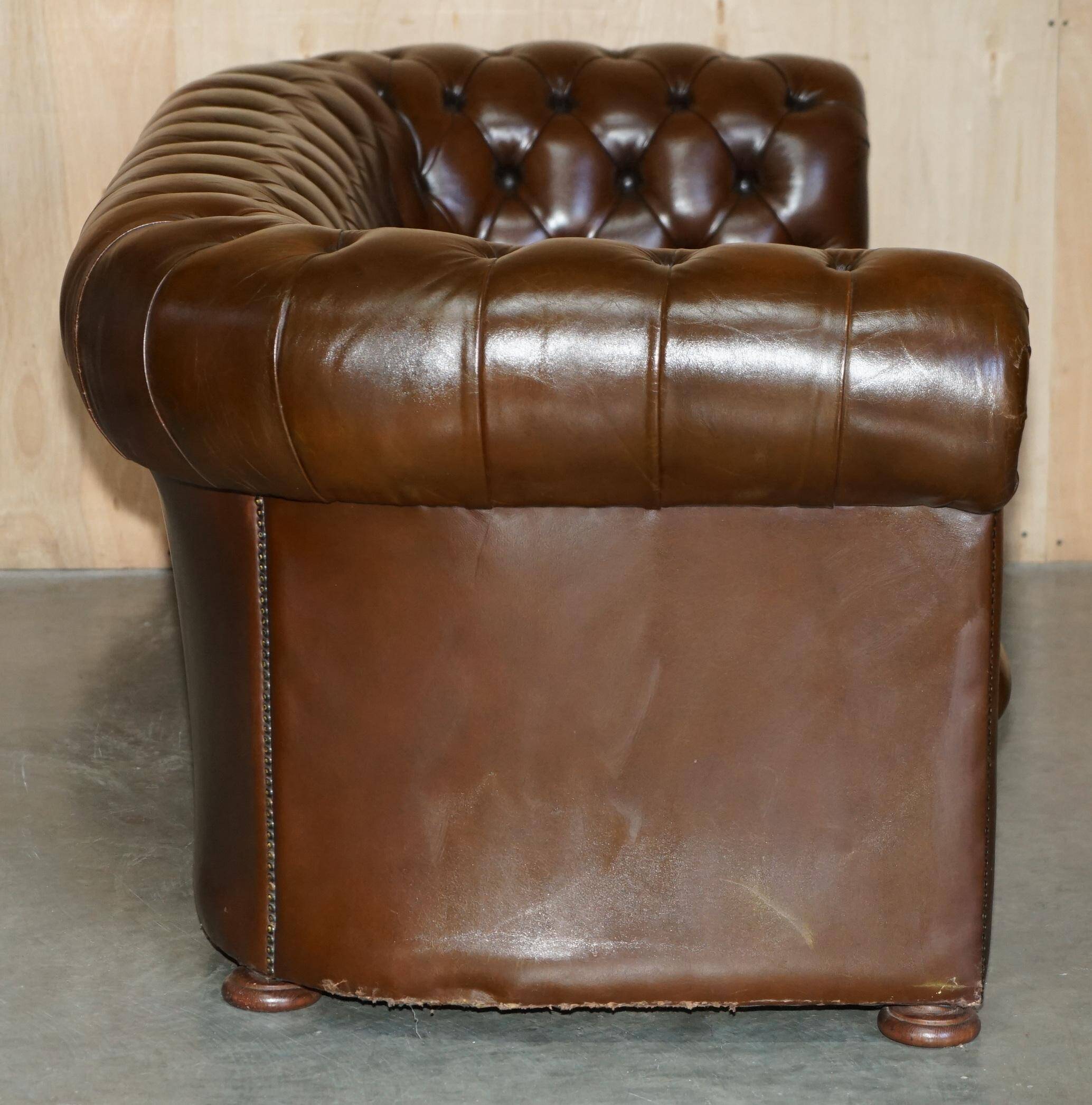 Restored Chesterfield leather sofa in vintage Art Deco style