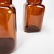Pair of amber glass jars