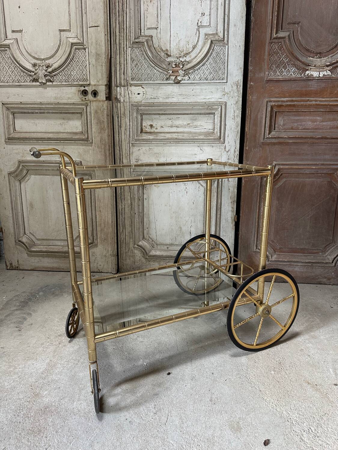 Vintage gold bar cart serving trolley