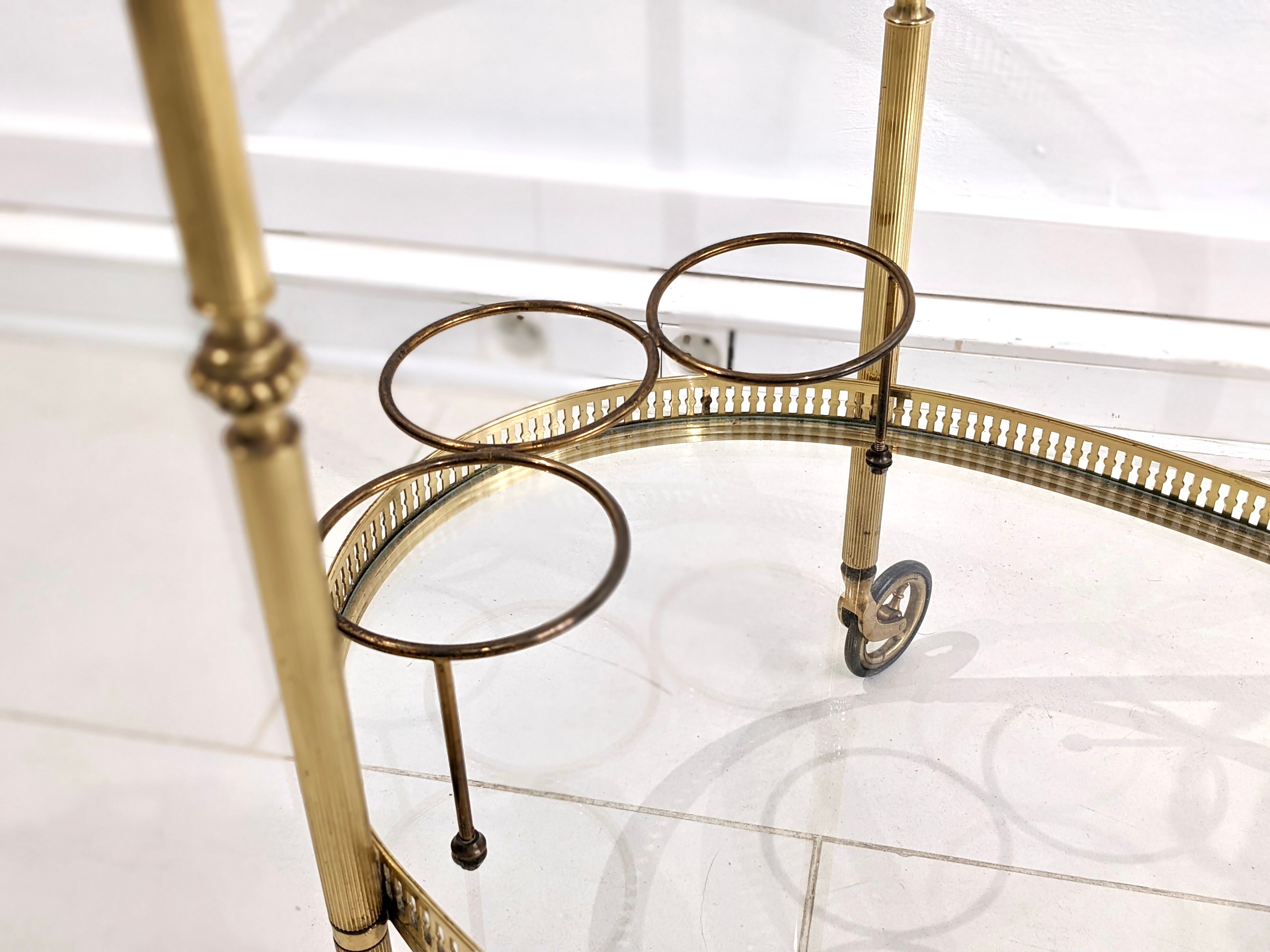 Golden metal dessert with glass tops