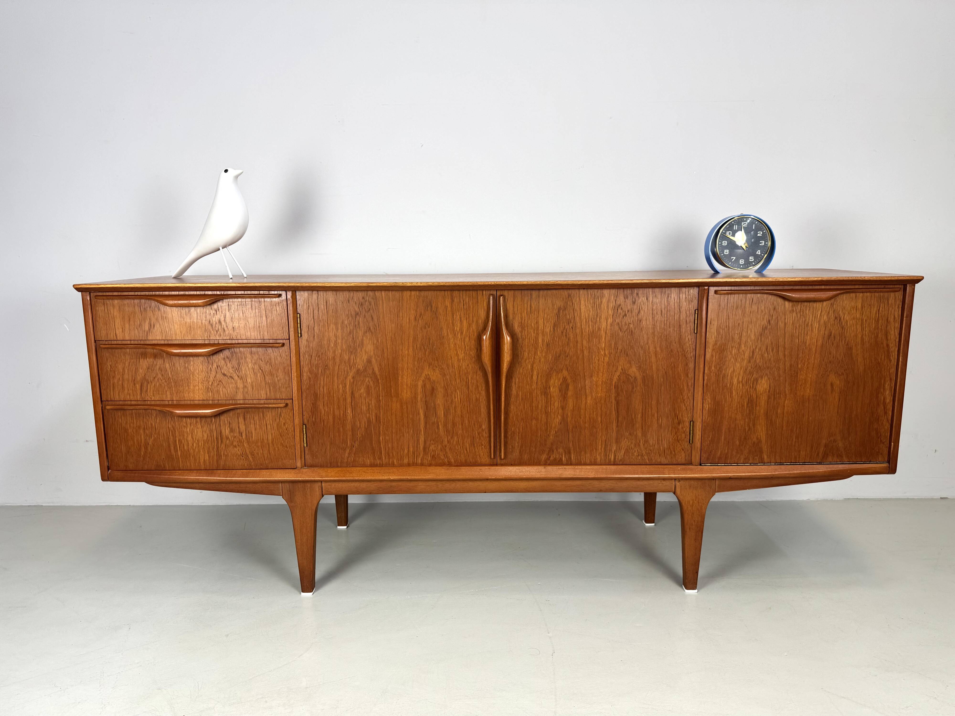 Vintage sideboard by Jentique from the 1960s .