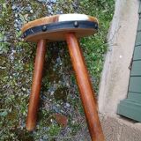 Antique tripod stool in wood and cowhide