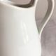 Pichet à lait ancien en porcelaine blanche épaisse