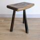 Antique tripod stool in patinated solid wood