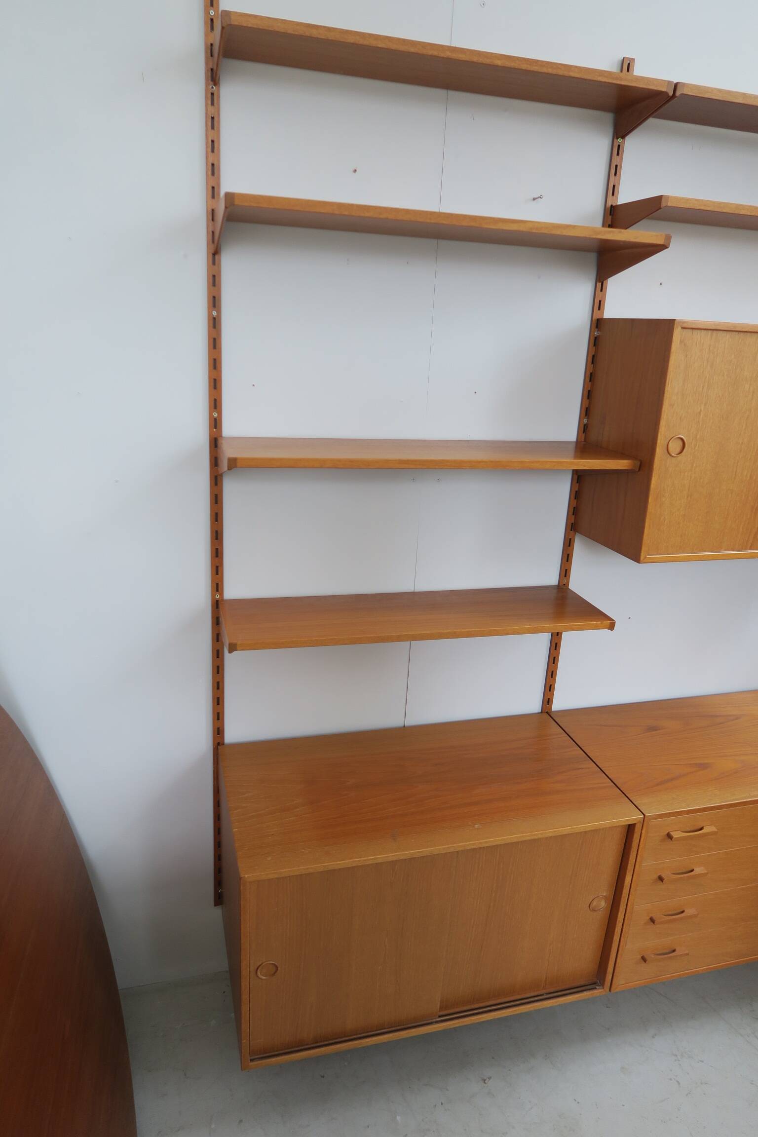 danish wall shelf unit in teak from the 60s by Kai Kristiansen