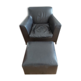 Fauteuil avec repose pied Cinna en cuir noir