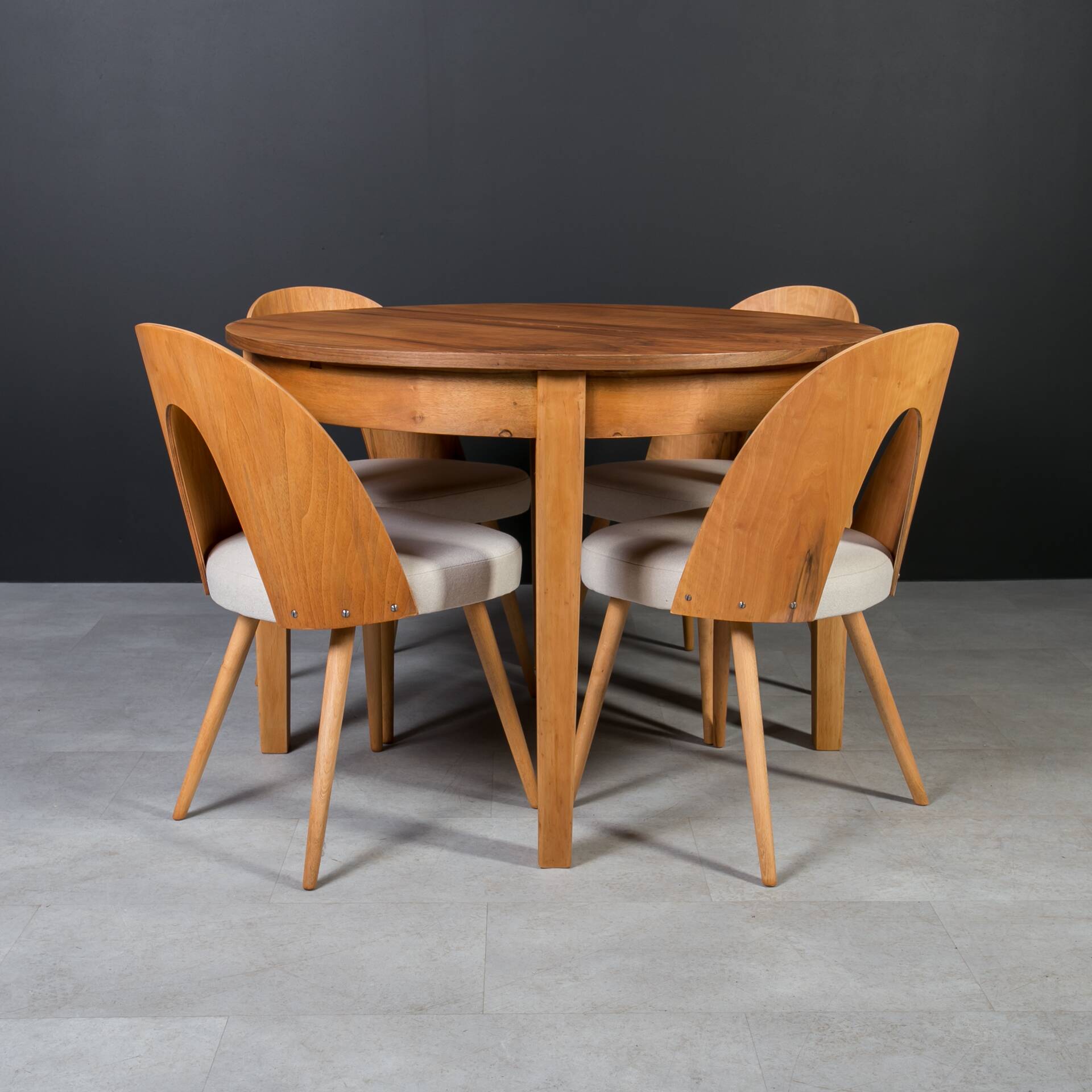 Unique dining set: Extendable round table and Czech chairs by Antonín Šuman