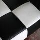 Roche Bobois black and white checkered leather bench, low bench.