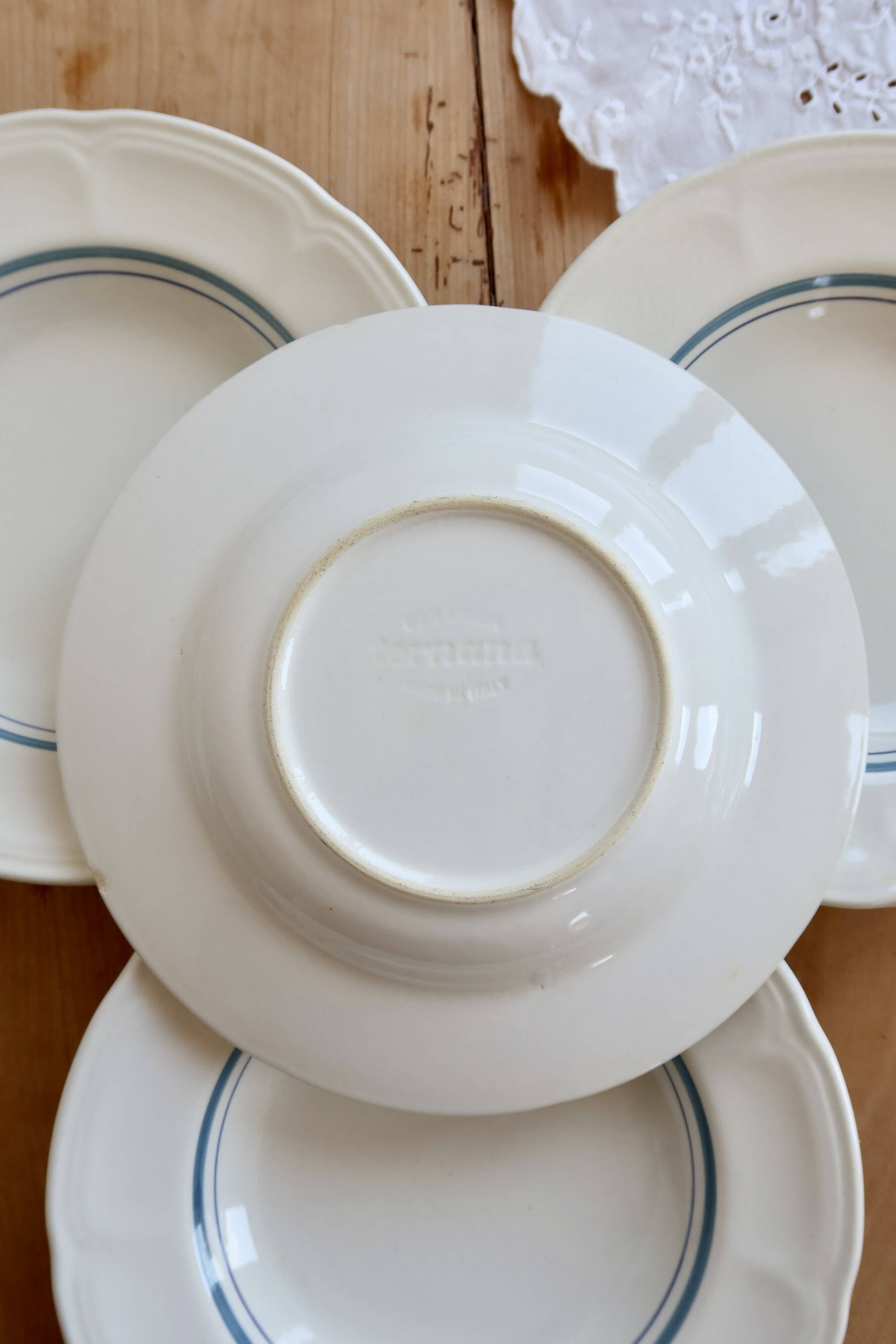 4 vintage ivory earthenware deep plates – double blue borders