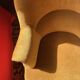 Paire de fauteuils crapaud jaune beige velours frange